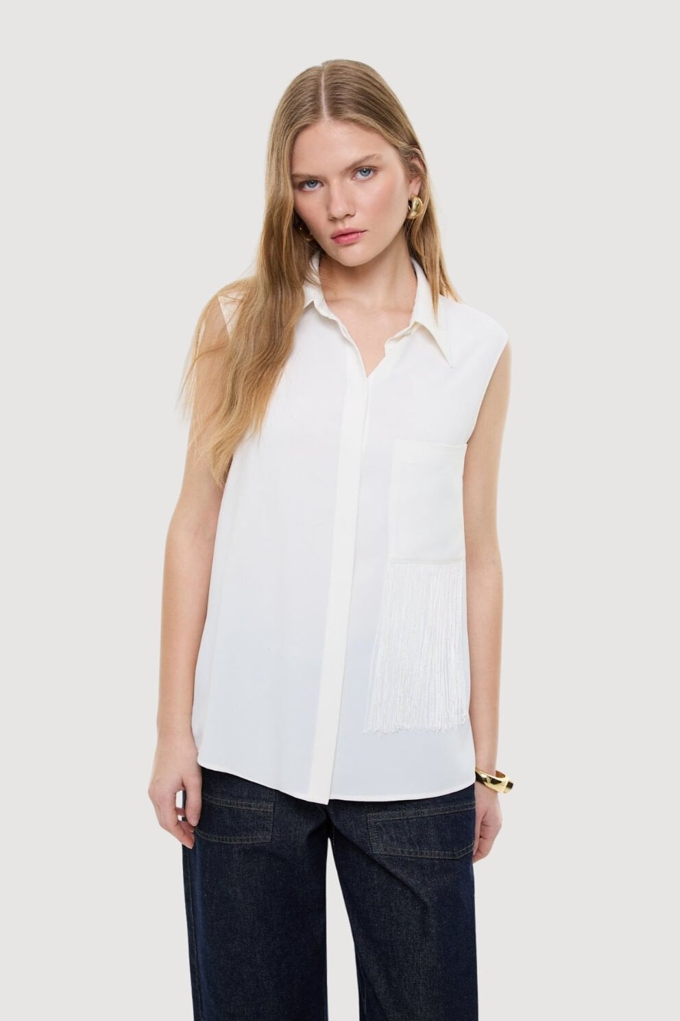 Roman Püskül Detaylı Kolsuz Gömlek Ekru